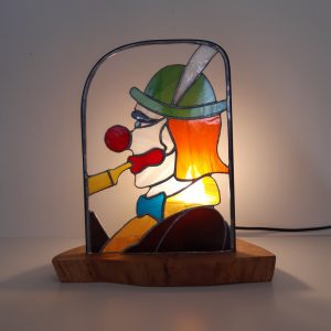 Lampe en vitrail Tiffany : Le clown au pipeau